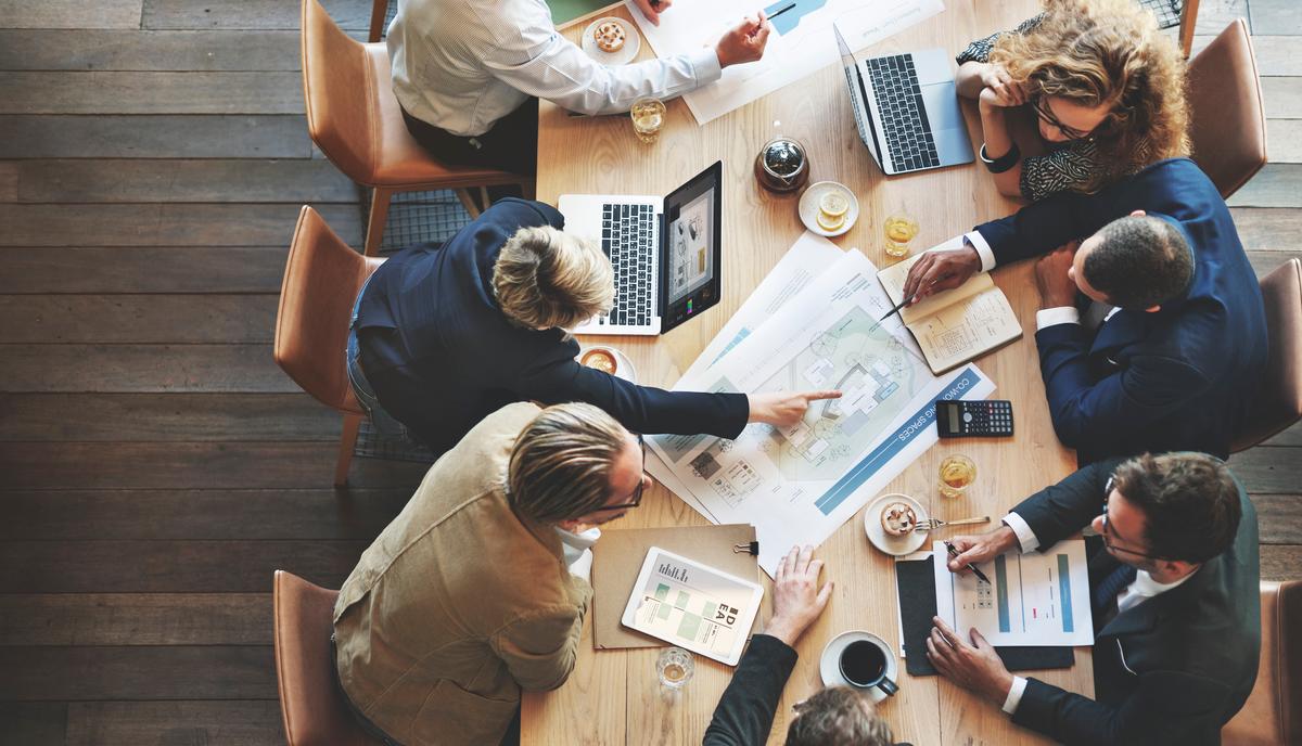 Business Meeting Around Conference Table