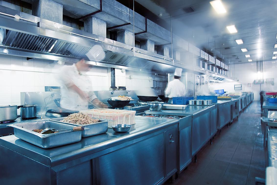 Chef in Kitchen Prepping Food