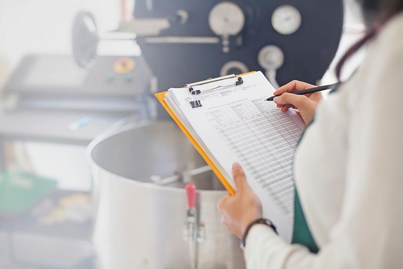 Worker Taking Notes