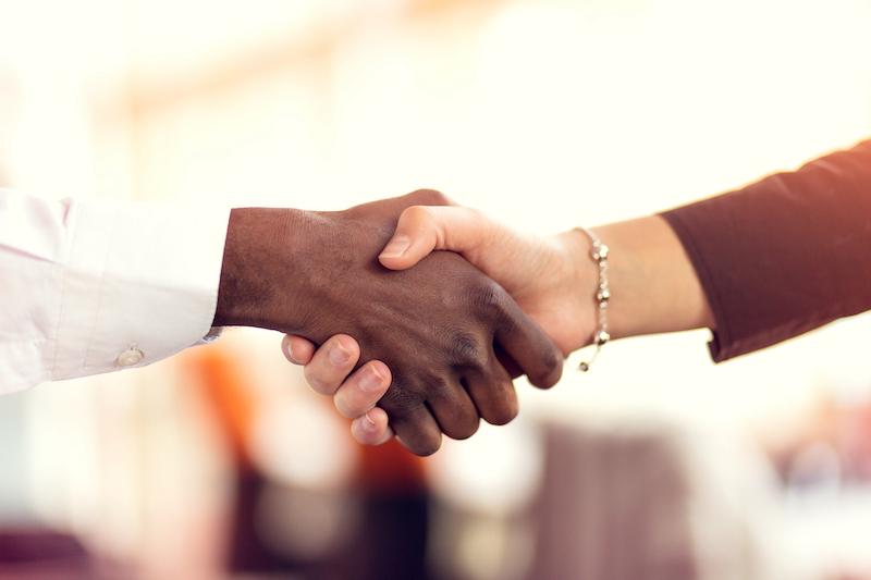 Two people shaking hands