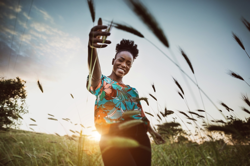 Woman in grass field