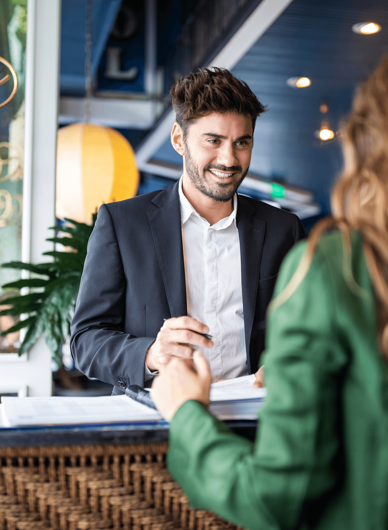 Business owner talking to a customer